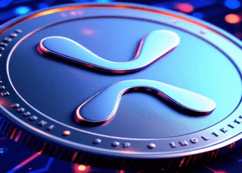 A close-up digital rendering of an XRP cryptocurrency coin with a stylized 'X' logo on its metallic blue surface, glowing with neon reflections, placed on a futuristic circuit board background illuminated by colorful pink, blue, and orange lights.